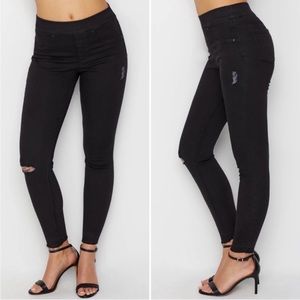 SPANX black distressed jeggings